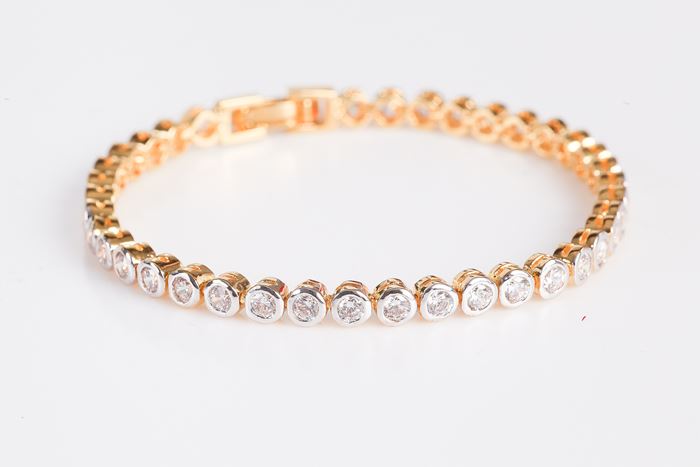 צמיד טניס חוליות עגולות דגם נוי