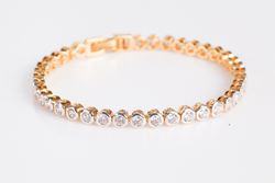 צמיד טניס חוליות עגולות דגם נוי